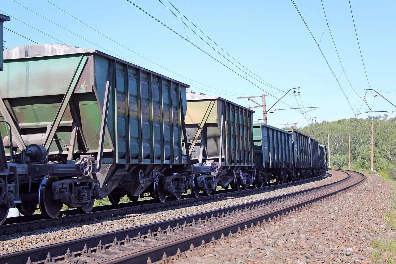 Hopper wagons on a railway line, the type of rail wagon used by aggregates and cement businesses