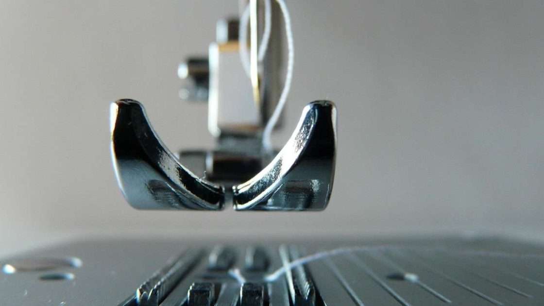 Industrial sewing machine in a commercial workroom, funded through embroidery and sewing machine finance