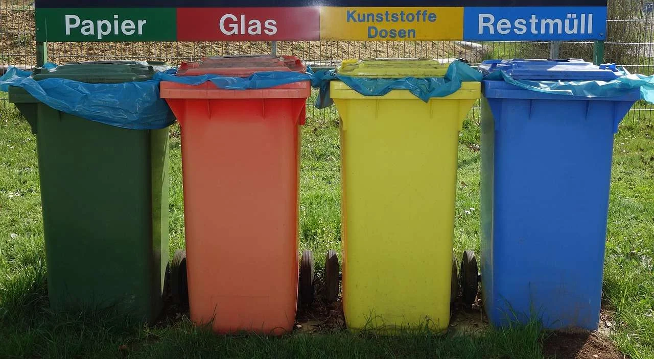 Waste separation bins for paper, plastic and general waste