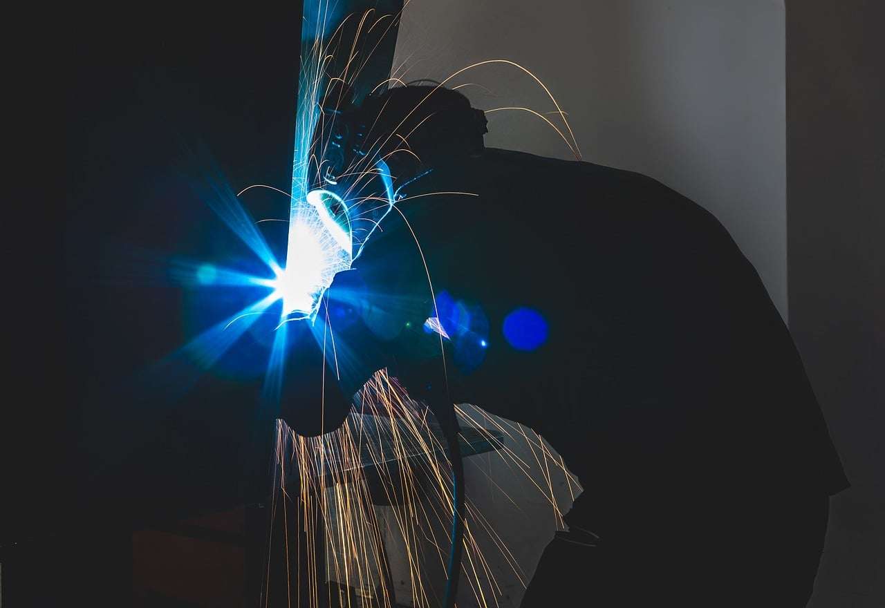 Welding machine finance for a fabricator welding steel in a workshop