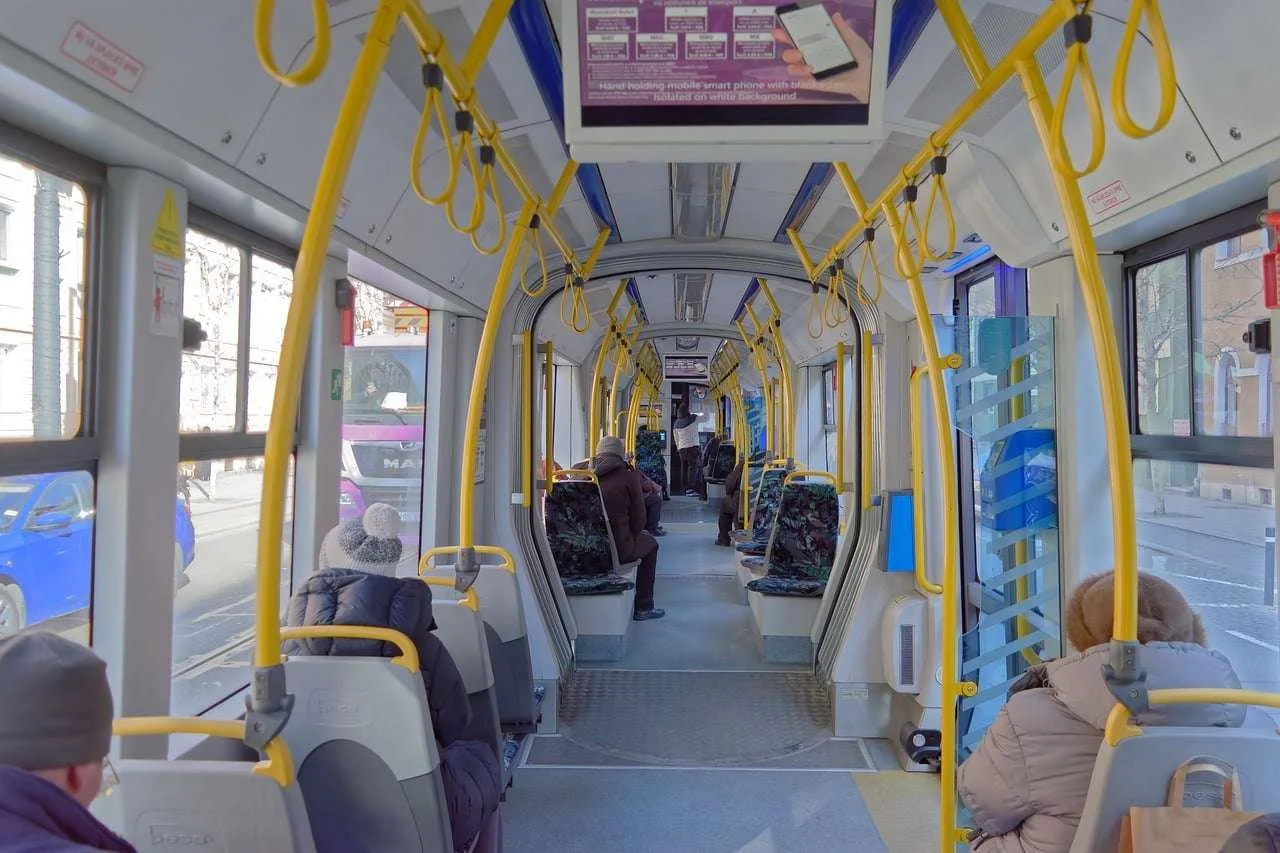 Passengers seated inside a tram