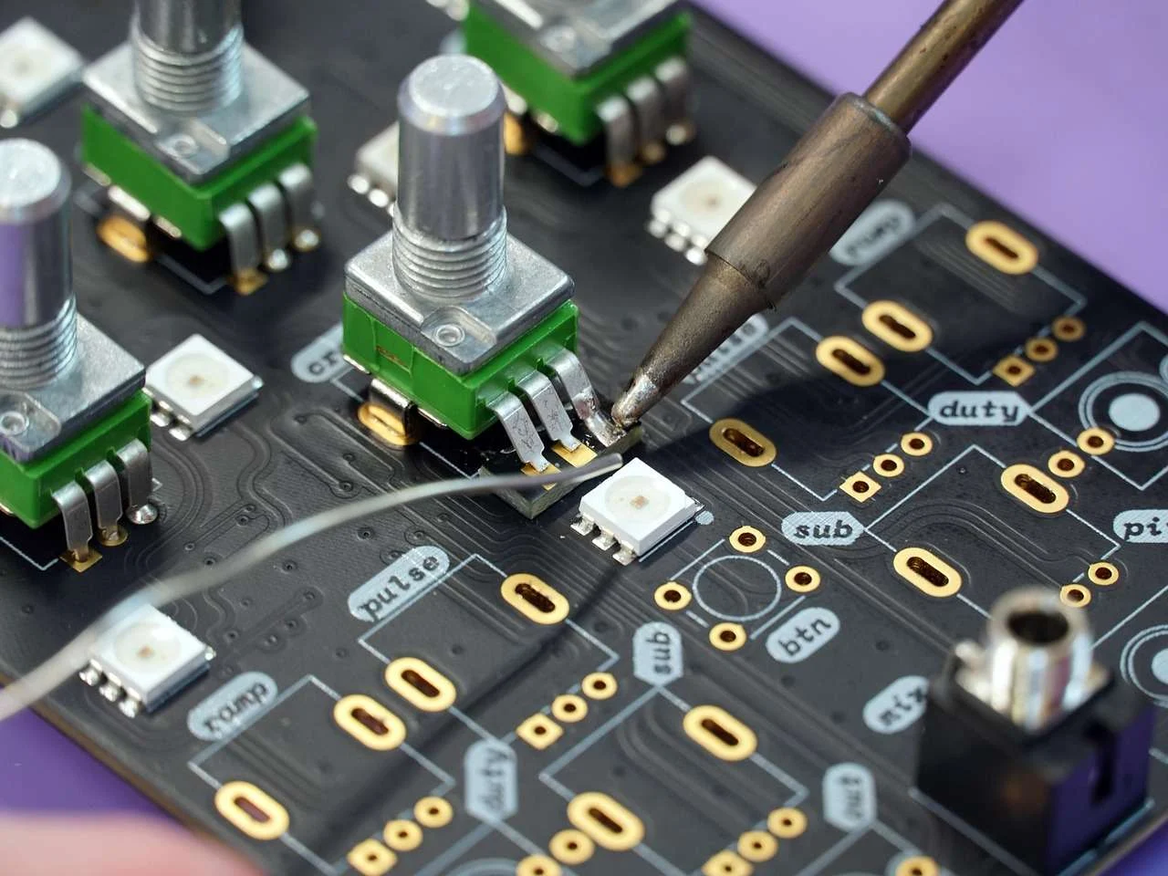 Circuit board under inspection in an electronics manufacturing facility