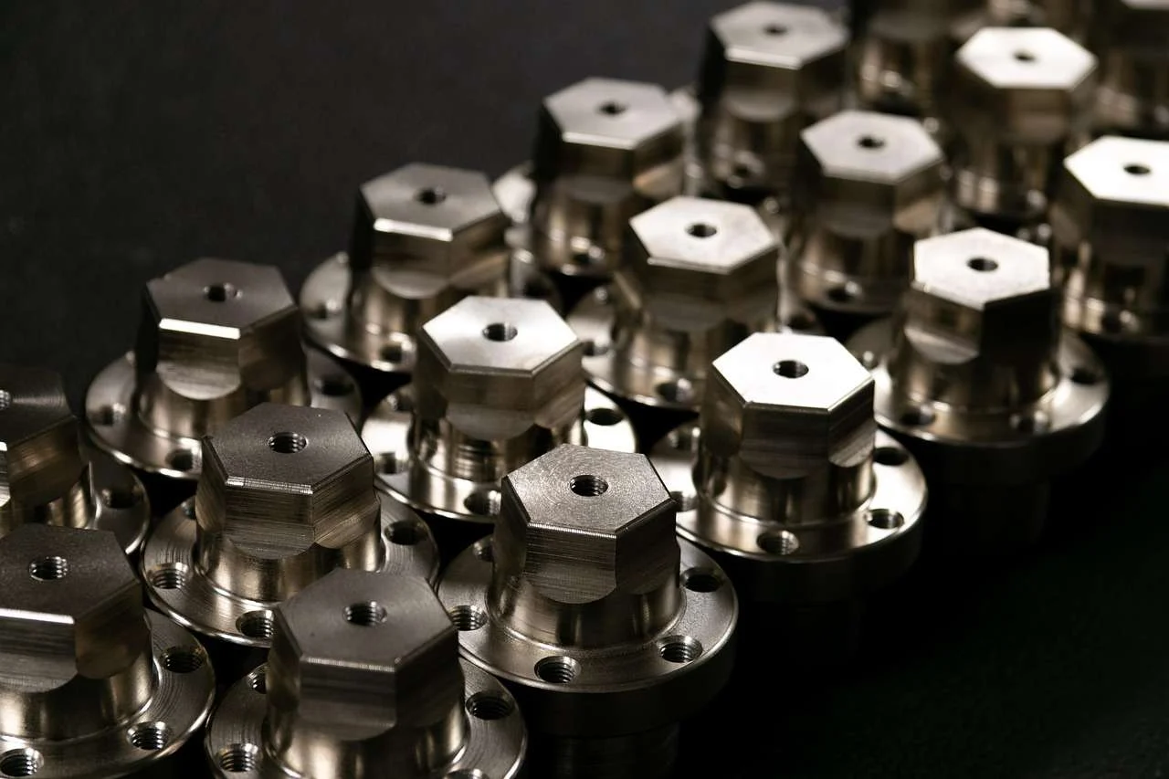 Close-up of finished steel parts made to tight tolerances