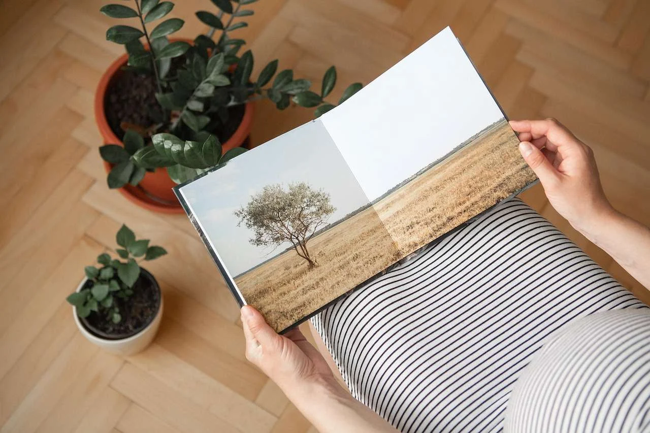 Printed photographs in a photo book, the kind of output a photo lab produces
