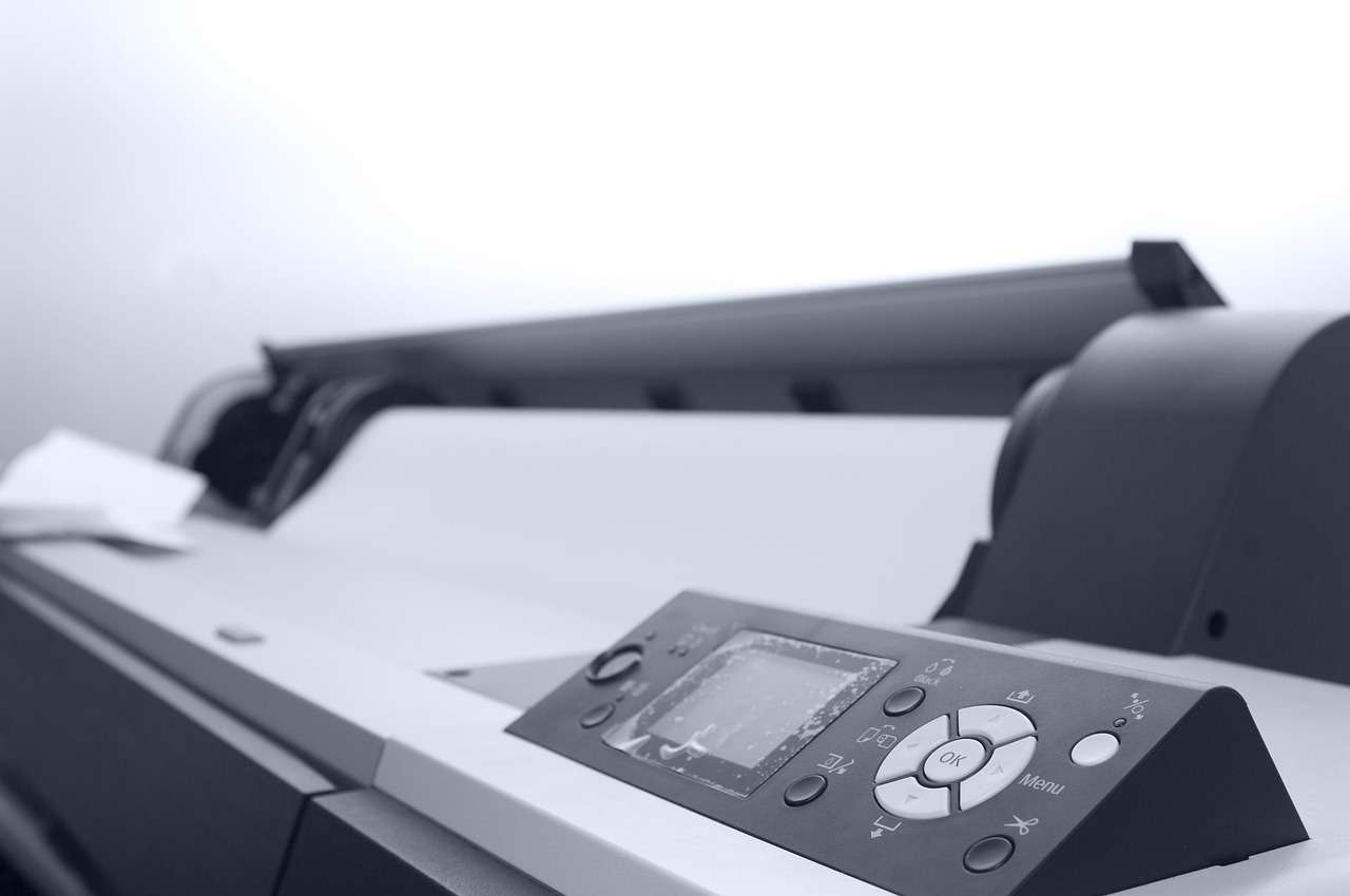Wide-format printer producing a large print on canvas