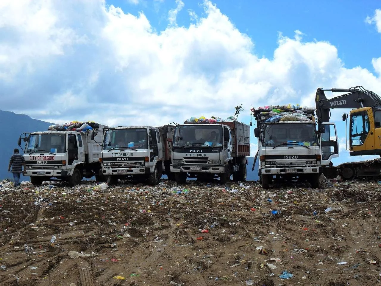 Trucks and plant working a waste site, equipment funded on hire purchase and leasing