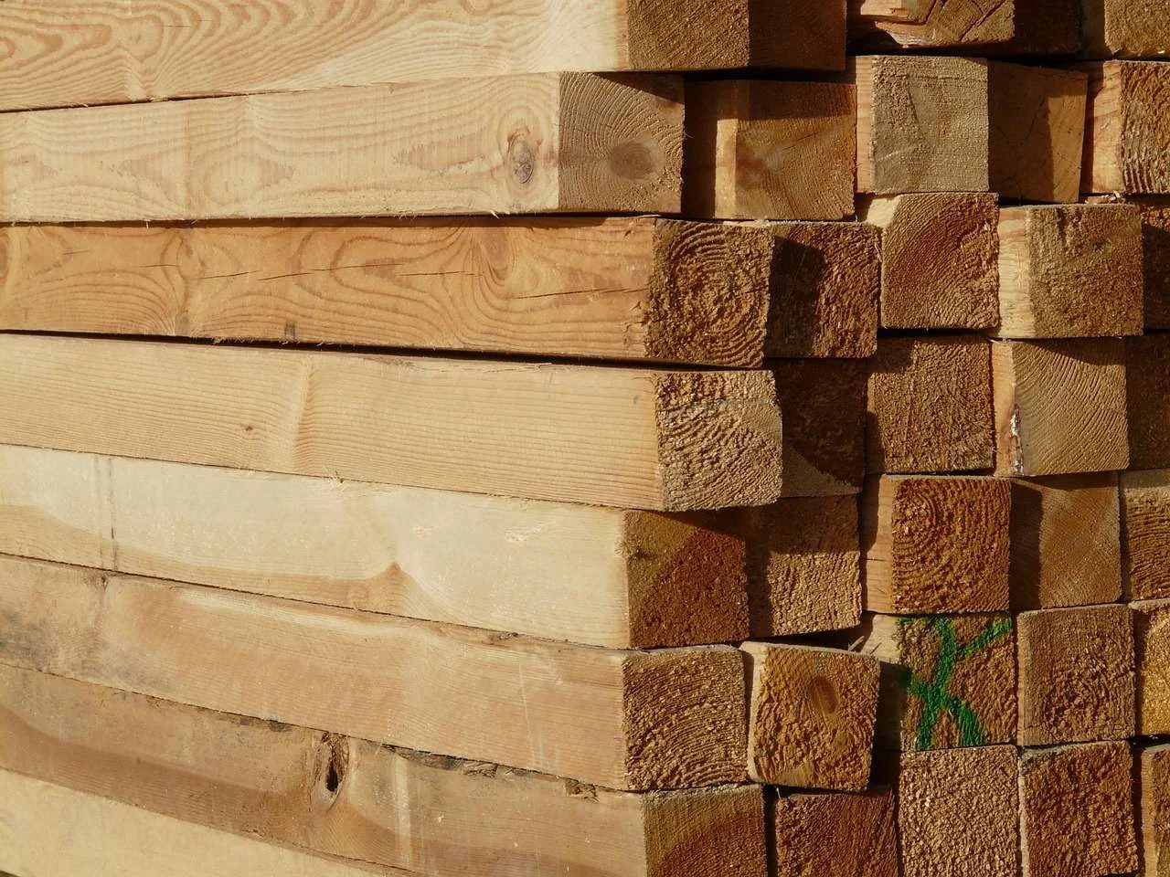 Stack of sawn timber boards ready for machining
