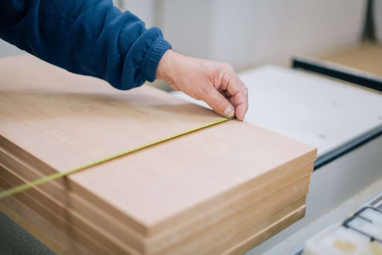 CNC router bed with vacuum pods in a joinery workshop