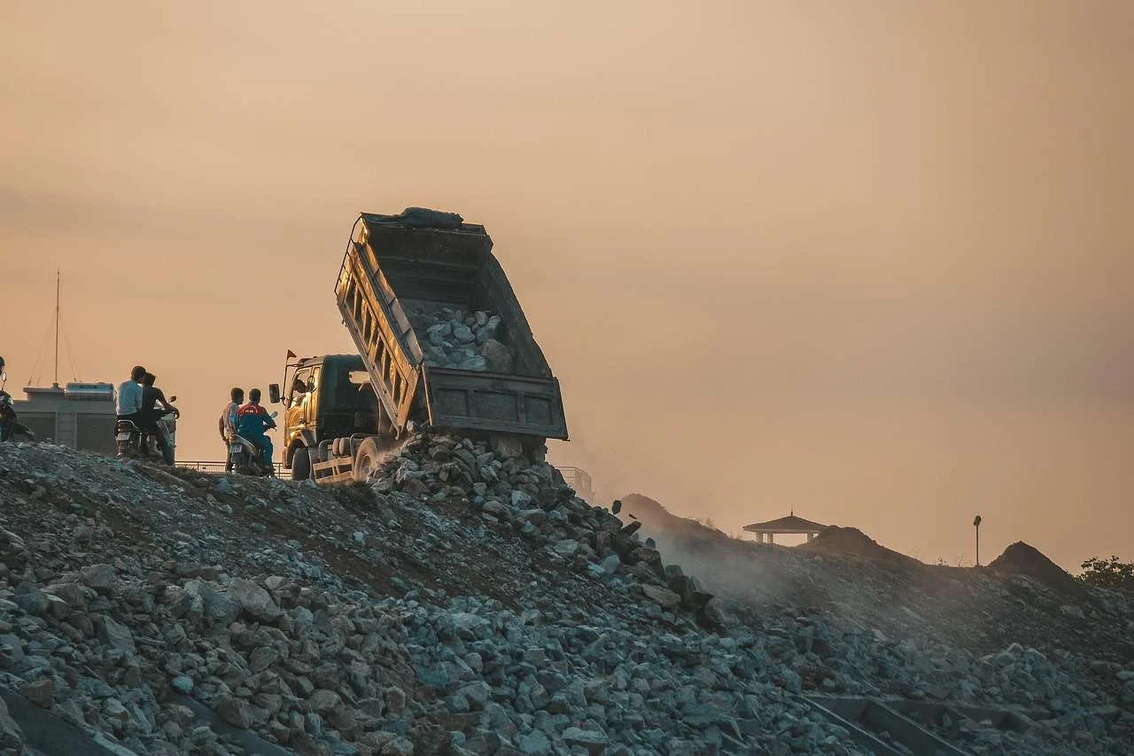 Waste tipped from a truck at a landfill and transfer site