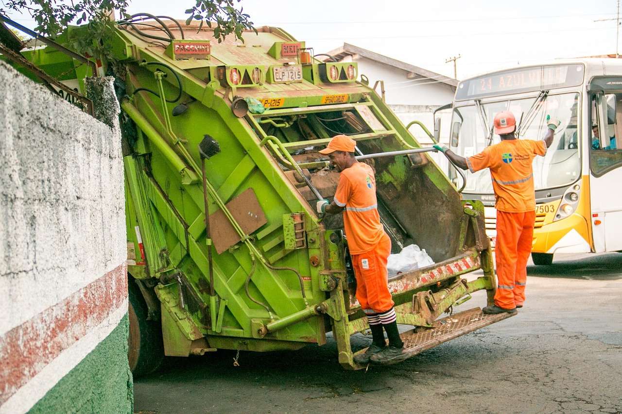 Refuse collection vehicle at the kerb, the type of vehicle waste management companies fund through asset finance