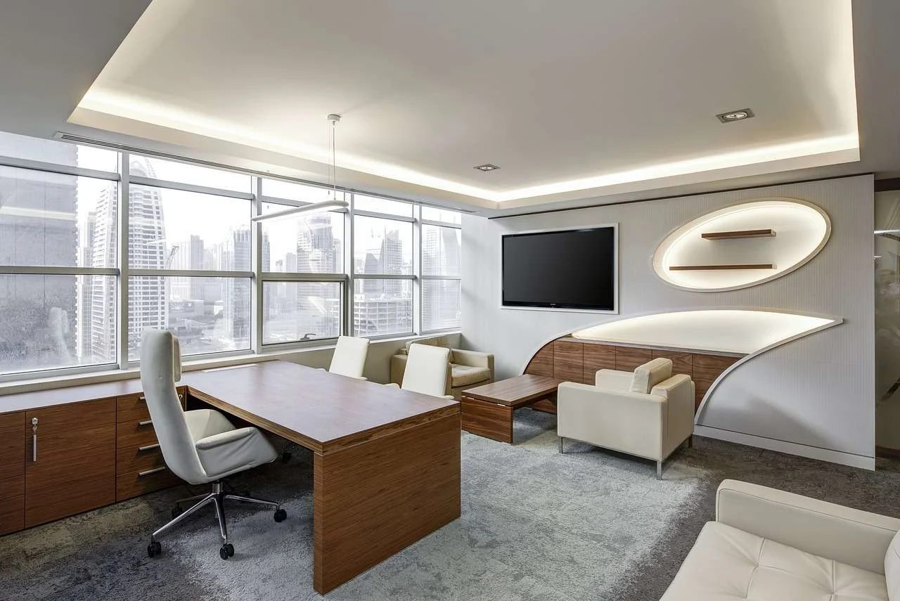 Executive office furnished with a desk, chairs and meeting table