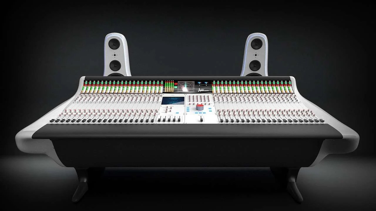 Large mixing console and monitor speakers in a recording studio
