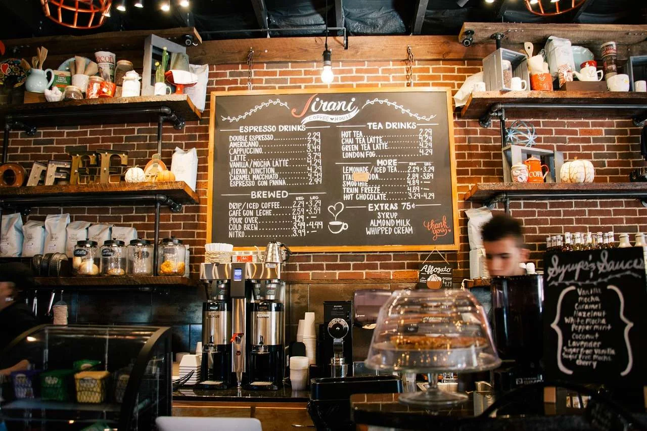 Cafe counter with espresso machine and coffee menu